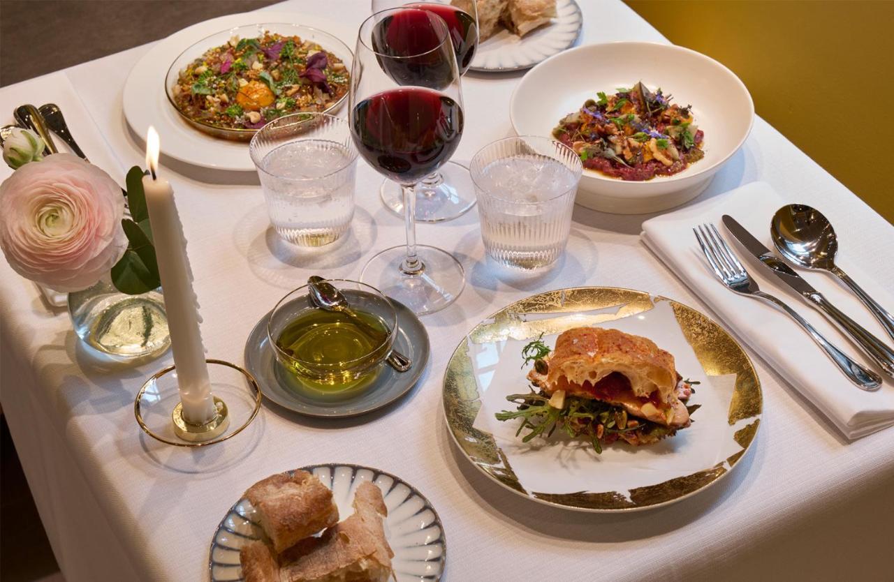 Villa Dagmar Stockholm Exteriér fotografie A selection of dishes at the restaurant
